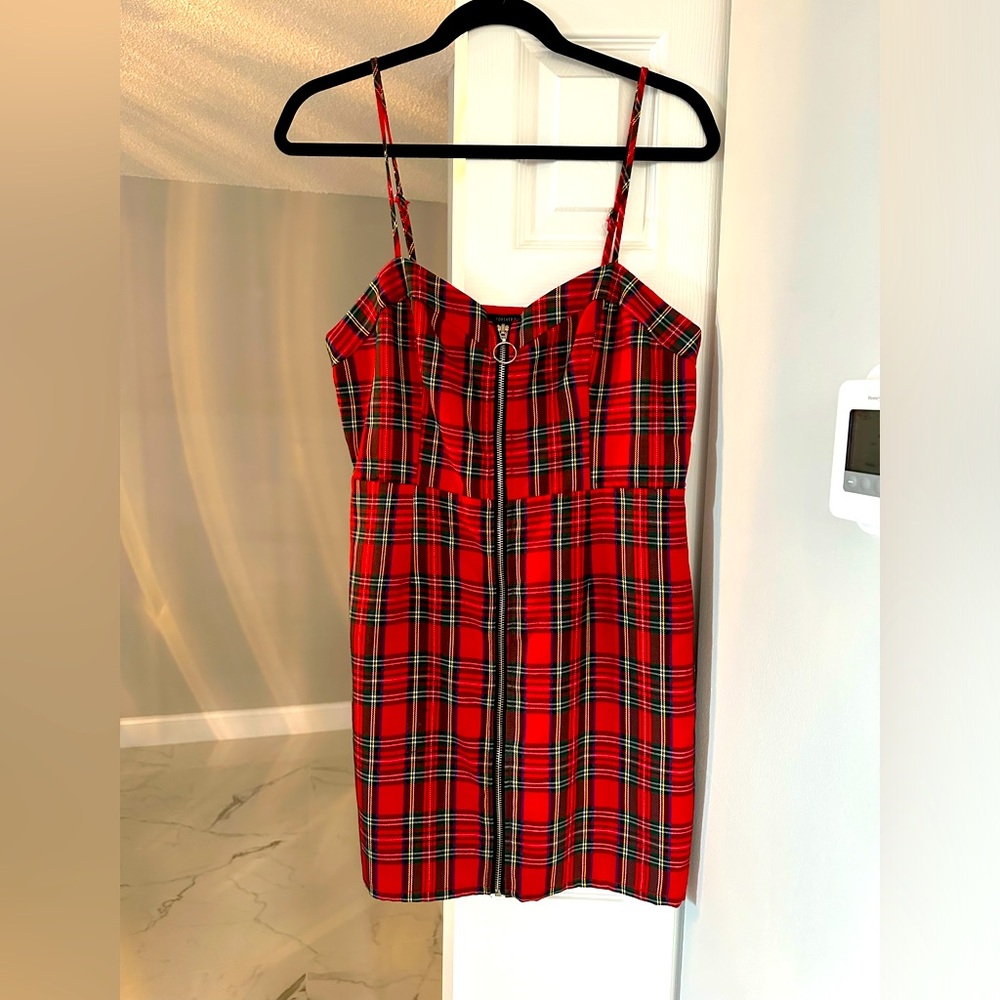 Sexy, zip-up plaid dress. Gorgeous Sleeveless. Size Large or Medium Strappy